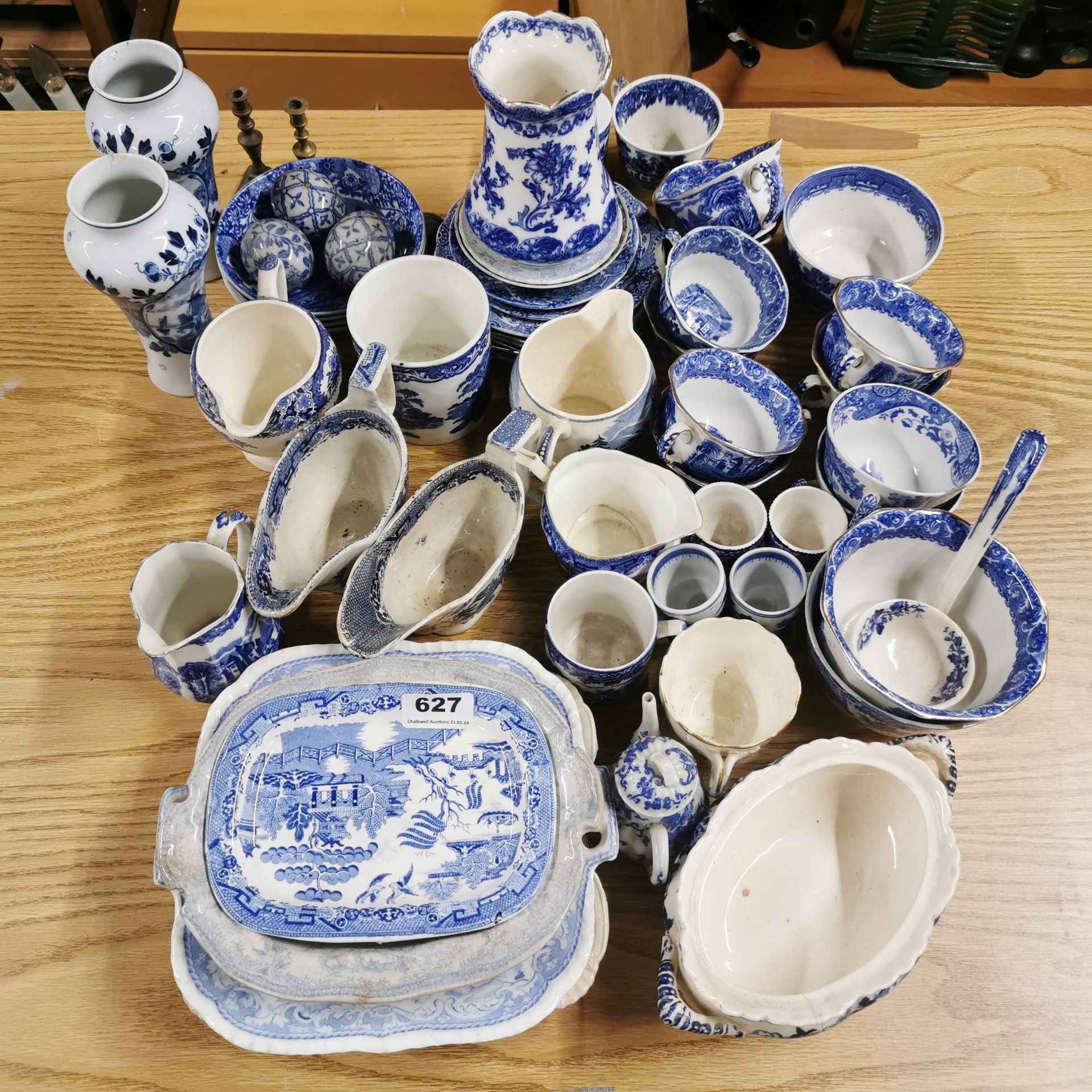 A quantity of mixed blue and white china.