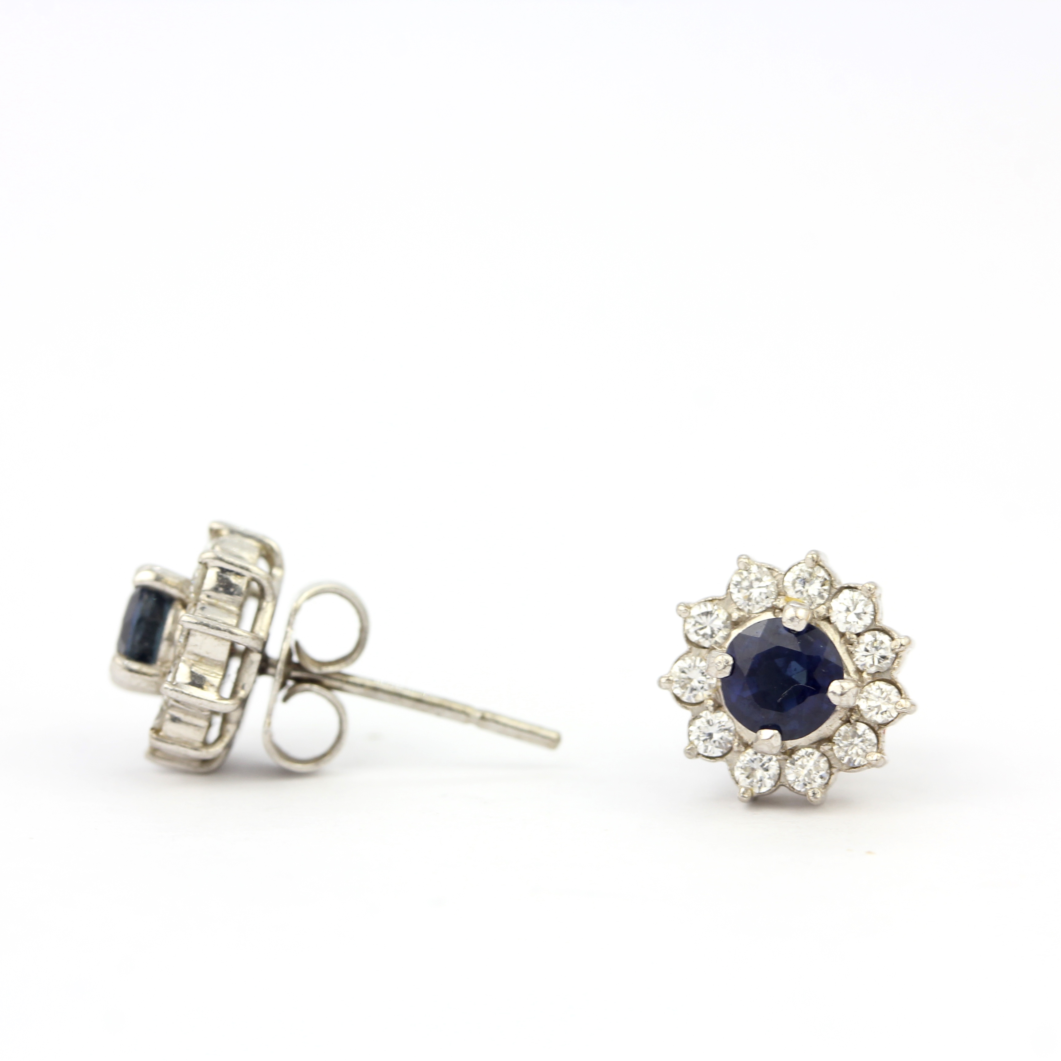 A pair of 18ct white gold cluster earrings set with sapphires and brilliant cut diamonds, Dia. 1cm. - Image 2 of 3