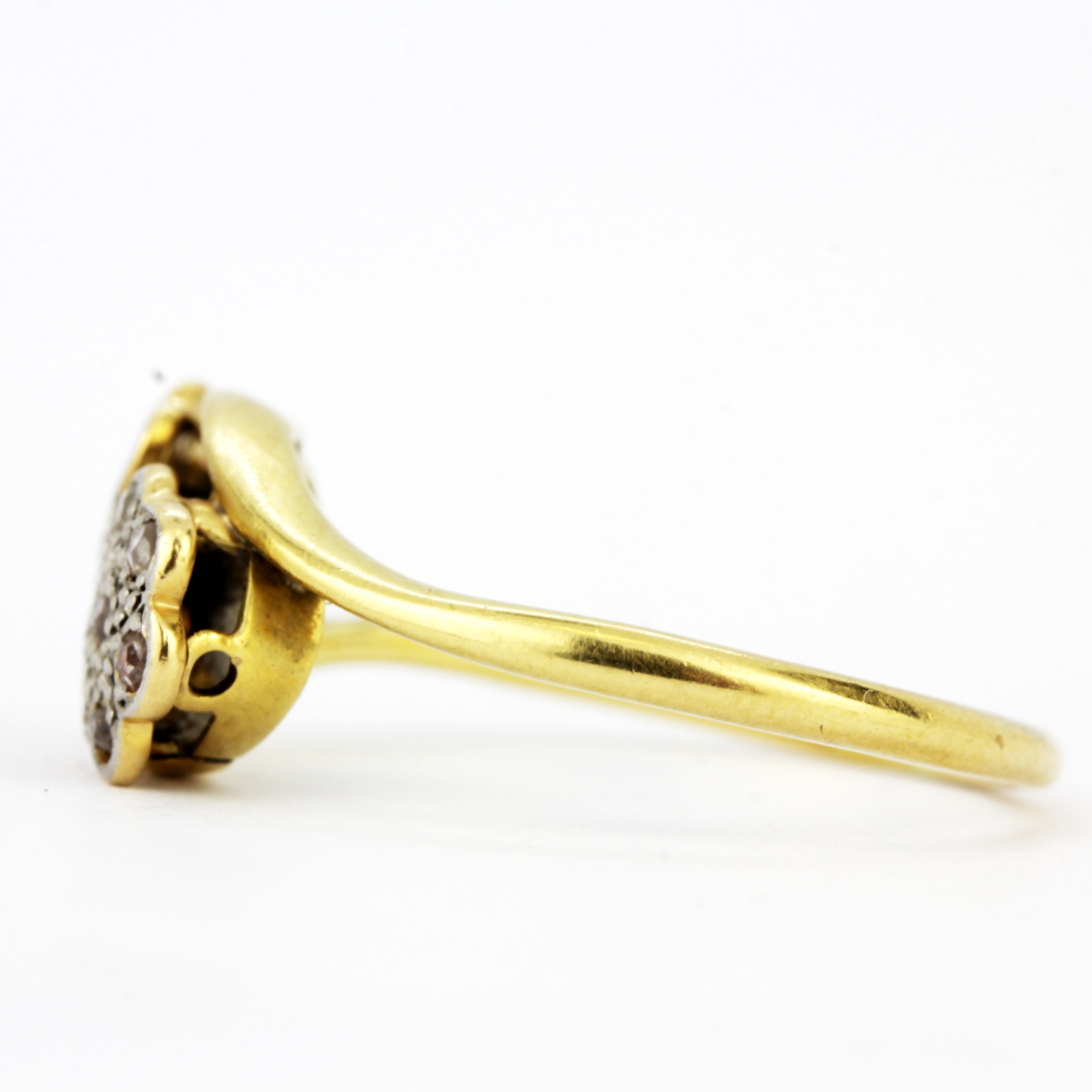 An 18ct gold and platinum diamond set crossover ring, (P.5). - Image 2 of 3