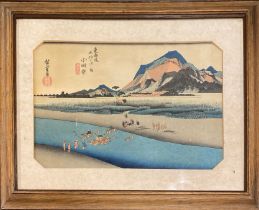 A framed Japanese woodblock print, frame size 47 x 36cm.