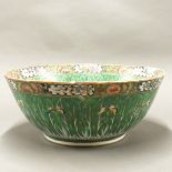 A large 19thC Chinese Canton enamelled bowl, Dia. 37cm, H. 15cm. Museum style restoration to rim.