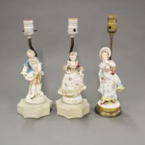 Three vintage porcelain and metal lamp bases, H. 34cm.