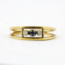 An 18ct yellow gold (stamped 18K) sapphire and diamond set ring, (P.5).