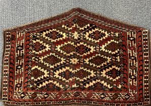 An early 20th century 'Asmalik' Turkoman handwoven rug, 94 x 61cm.