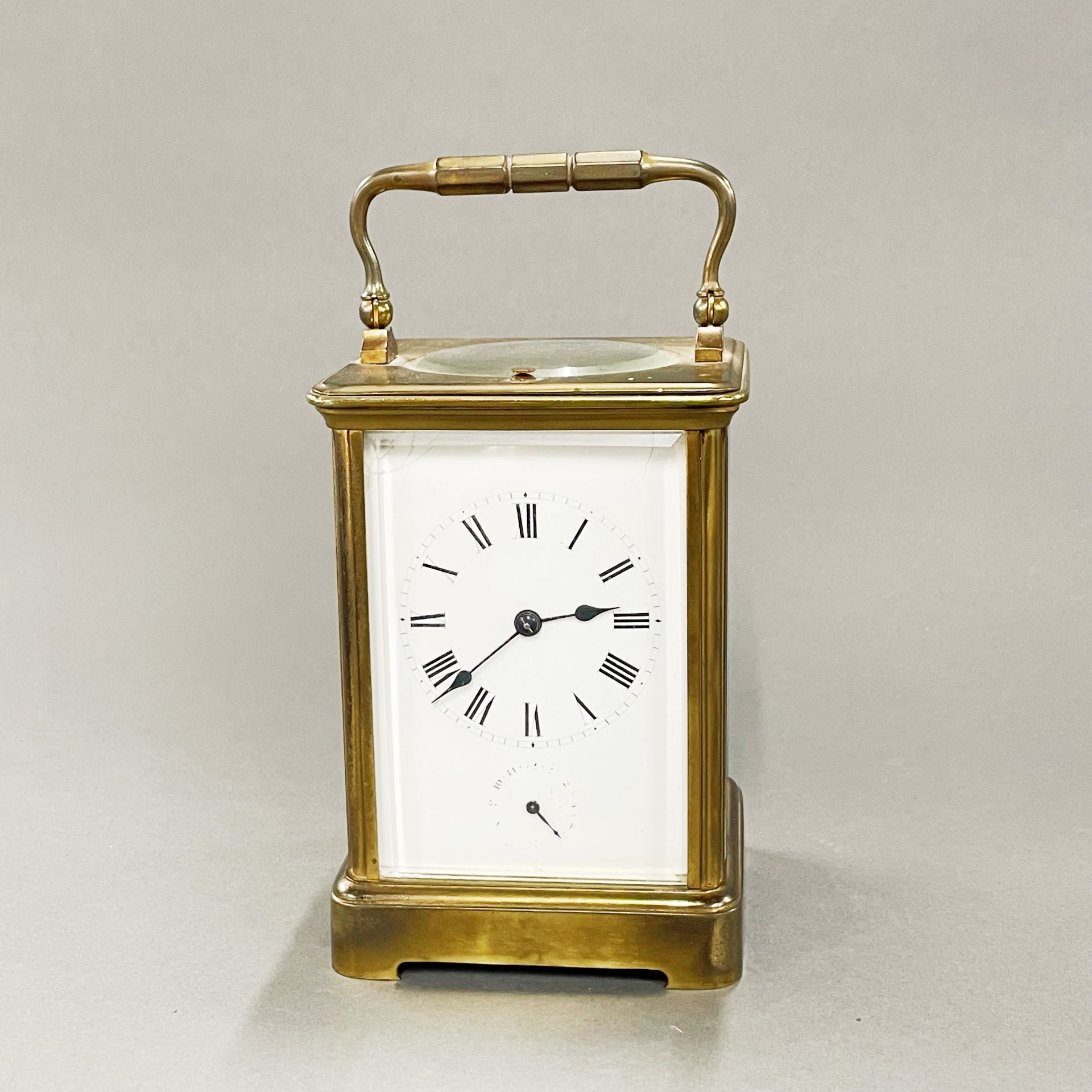 A French brass alarm carriage clock by Richard et cie, Paris in London, H. 18cm, understood to be in