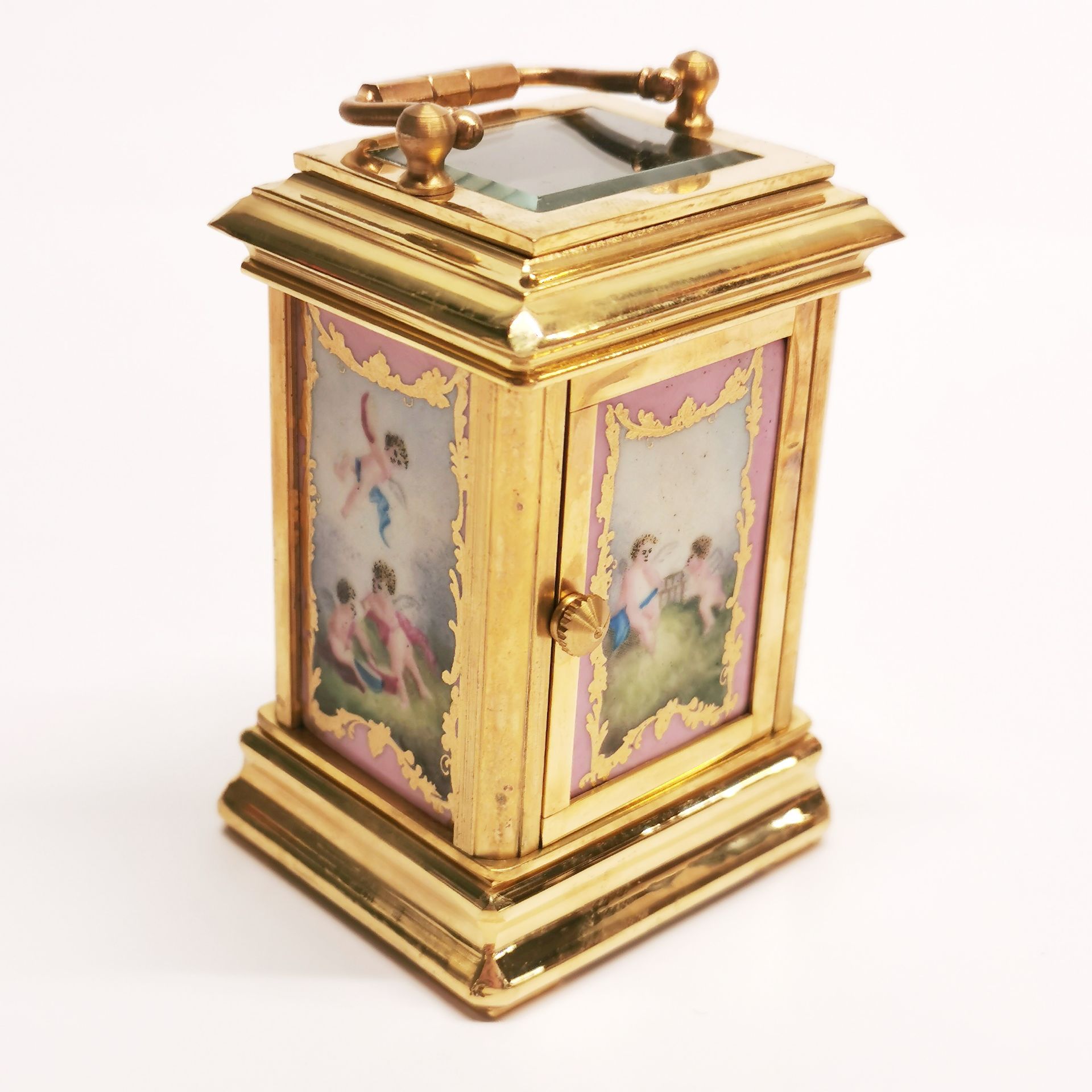 A miniature gilt brass and porcelain carriage clock, H. 10cm. - Image 3 of 3