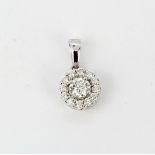 A hallmarked 18ct white gold diamond set pendant, estimated approx. 0.28ct centre stone, L. 1.5cm.