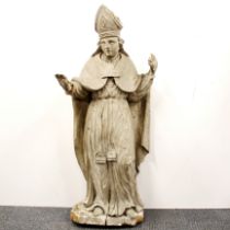 A large painted carved wooden religious statue (17th/18thC), H. 97cm.