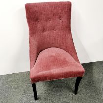 An upholstered button backed bedroom chair, H. 97cm.