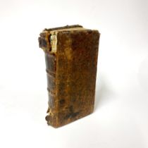 A 1624 volume of Carminum Poetarum, L. 12cm.