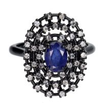 A matching 925 silver ring set with an oval cut sapphire and white stones, (O).