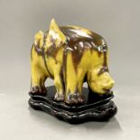A rare Chinese glazed ceramic figure of a six legged mythical animal (Dijiane) with a purpose made