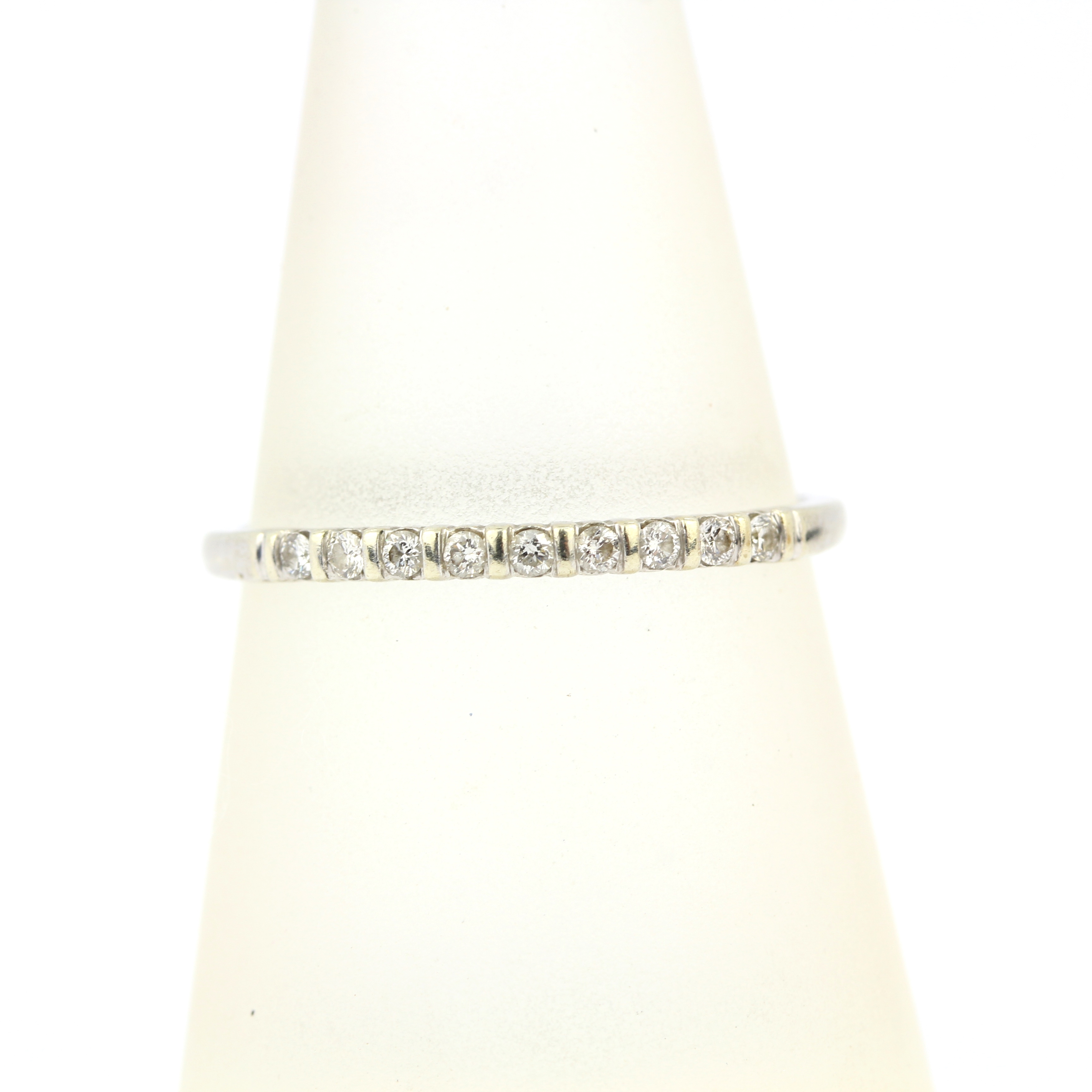 A 9ct white gold diamond set half eternity ring, (P.5). - Image 3 of 3