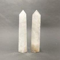 A pair of polished quartz crystal obelisk pillars, H. 29cm.