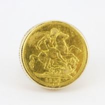 A 9ct yellow gold mounted sovereign ring, (Q.5).
