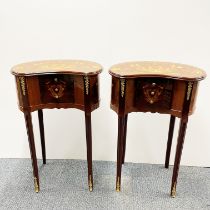 A pair of kidney shaped inlaid bedside cabinets, W. 52cm, H. 76cm.
