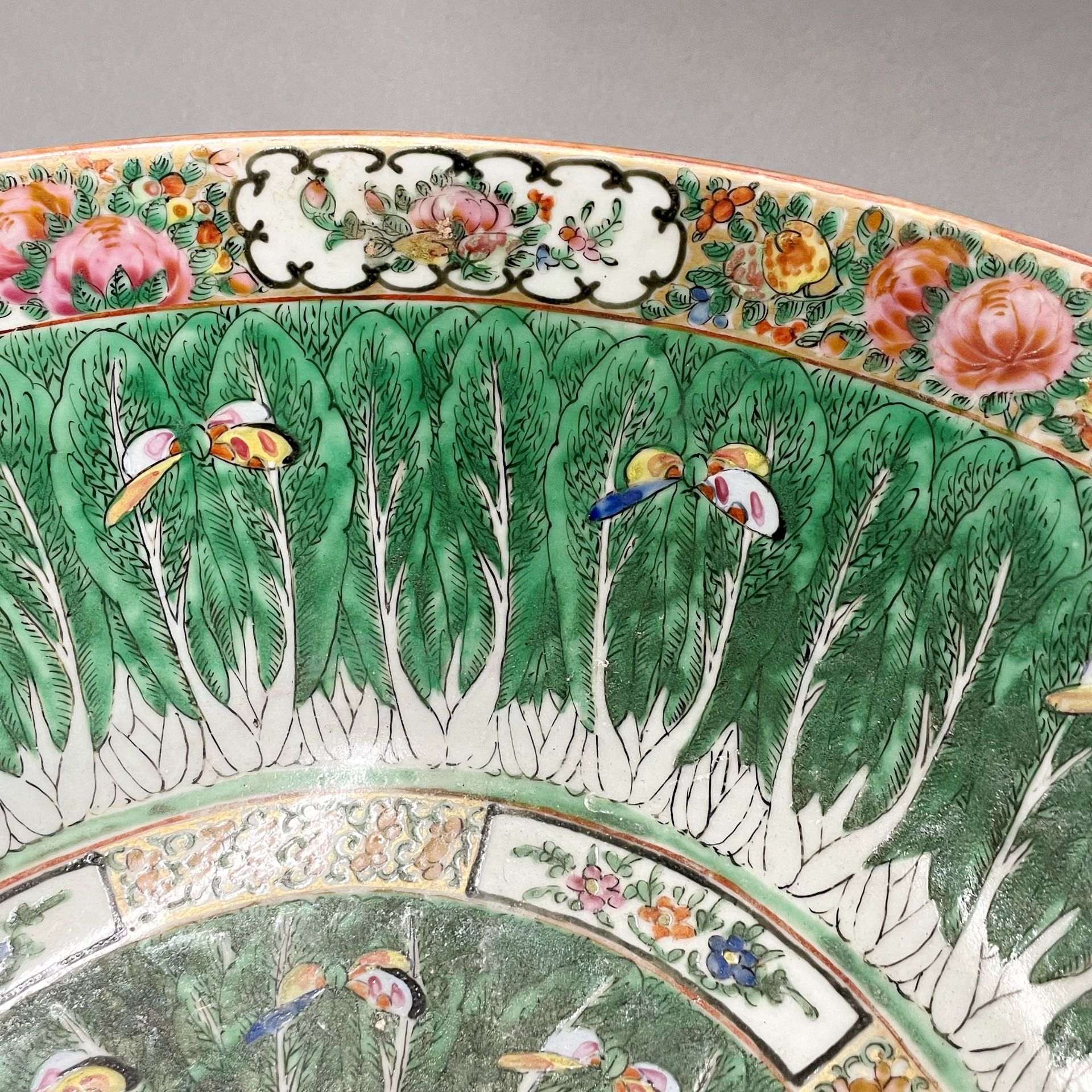 A large 19thC Chinese Canton enamelled bowl, Dia. 37cm, H. 15cm. Museum style restoration to rim. - Image 3 of 5