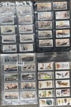 A quantity of cigarette cards.