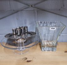 A heavy quality glass cake stand with a vase and silver plated liquor set.