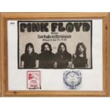 A framed poster from 'Pink Floyd' concert at the Sports Hall Olympic Park, Munich 1972 along with