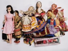 A quantity of vintage collector's dolls.