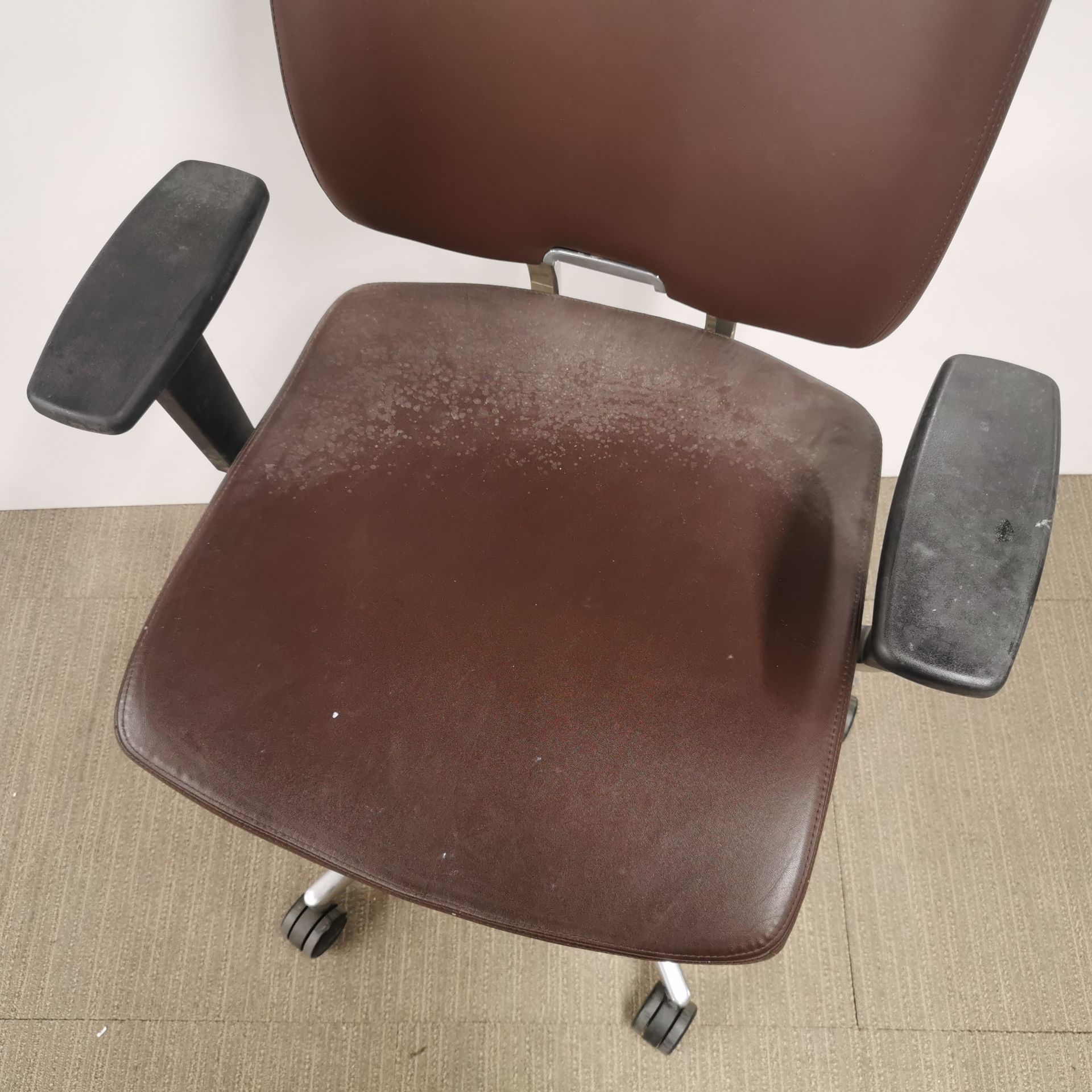 An adjustable faux leather and chrome revolving desk chair. - Image 2 of 4