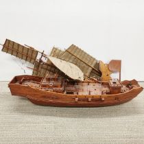 A lovely Chinese wooden model of a Junk, L. 65cm.