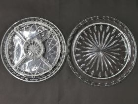 A cut crystal hors d'ouvres, Dia. 23cm. Together with a further cut crystal dish.