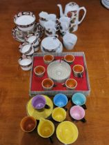 A 1960's Palissy Harlequin coffee set with a French coffee set, a 1970's coffee set and a group of