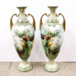 A pair of finely decorated porcelain vases, H. 26cm.