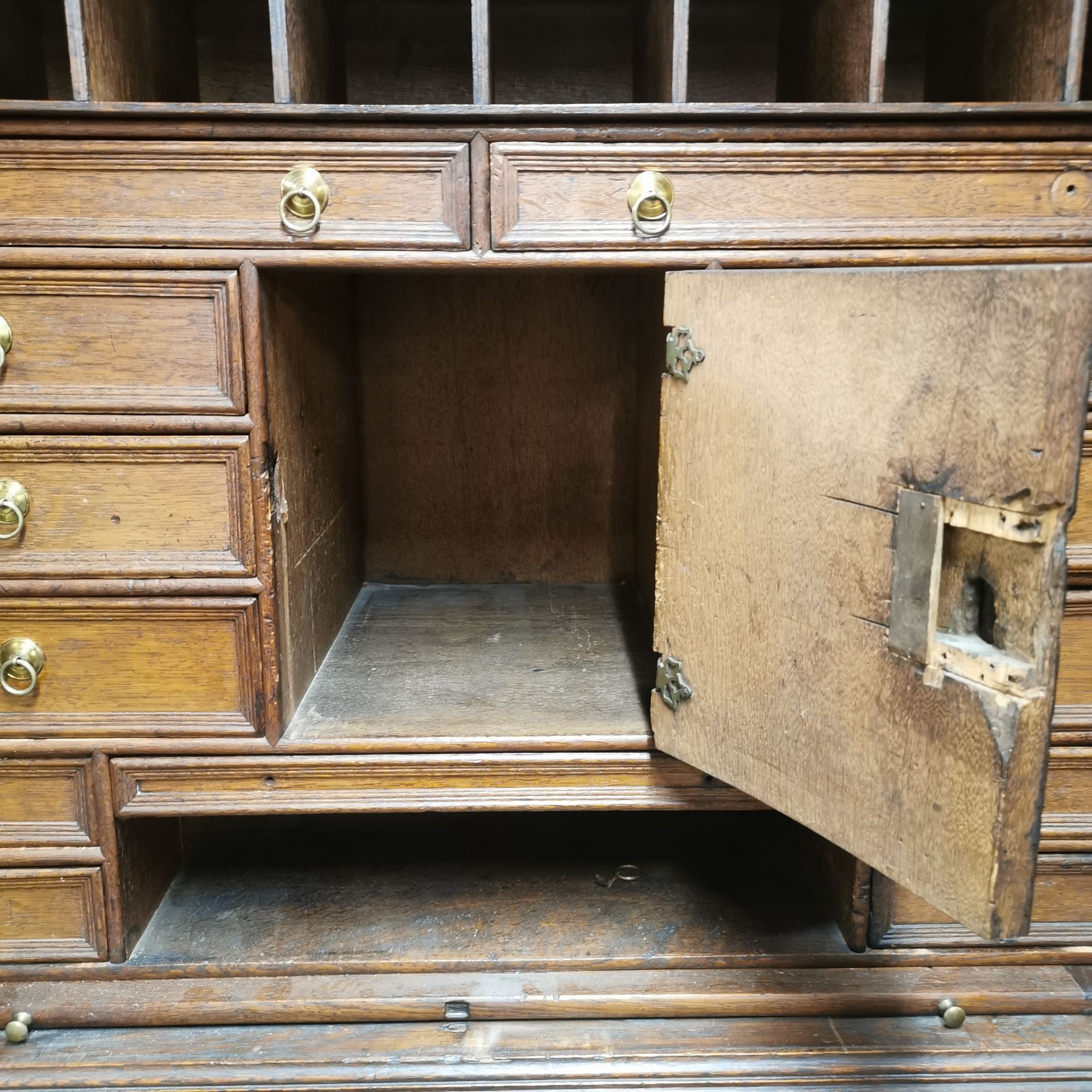 A thirteen drawer oak Cromwellian style cabinet desk with a pull out writing platform and a large - Image 5 of 6