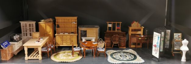 A quantity of dolls house furniture, tallest L. 18cm.