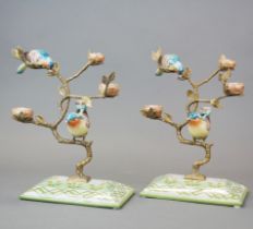 A pair of ormulu mounted bird centerpieces, H. 26cm.