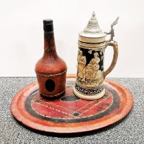 A handmade leather tray and covered bottle with a German Stein, tray W. 39cm.