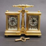 A gilt brass and porcelain panel carriage clock and barometer, H. 10cm.