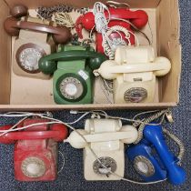 A group of vintage telephones.