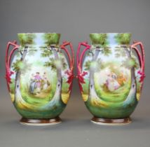 A pair of double handled hand painted porcelain vases, H. 36cm.