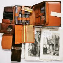 A group of gentlemen's travelling sets and prints.