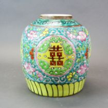 An early 20thC Chinese Canton enamelled ginger jar decorated with a character of double happiness,
