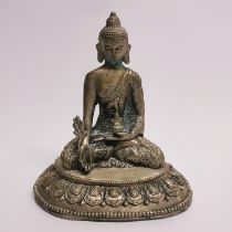 A silvered brass figure of a seated Buddha, H. 20cm.