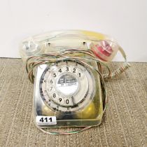 An unusual clear cased vintage telephone.