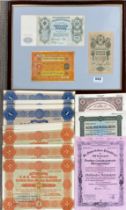 Three early framed banknotes, together with a group of reproduction banknotes.
