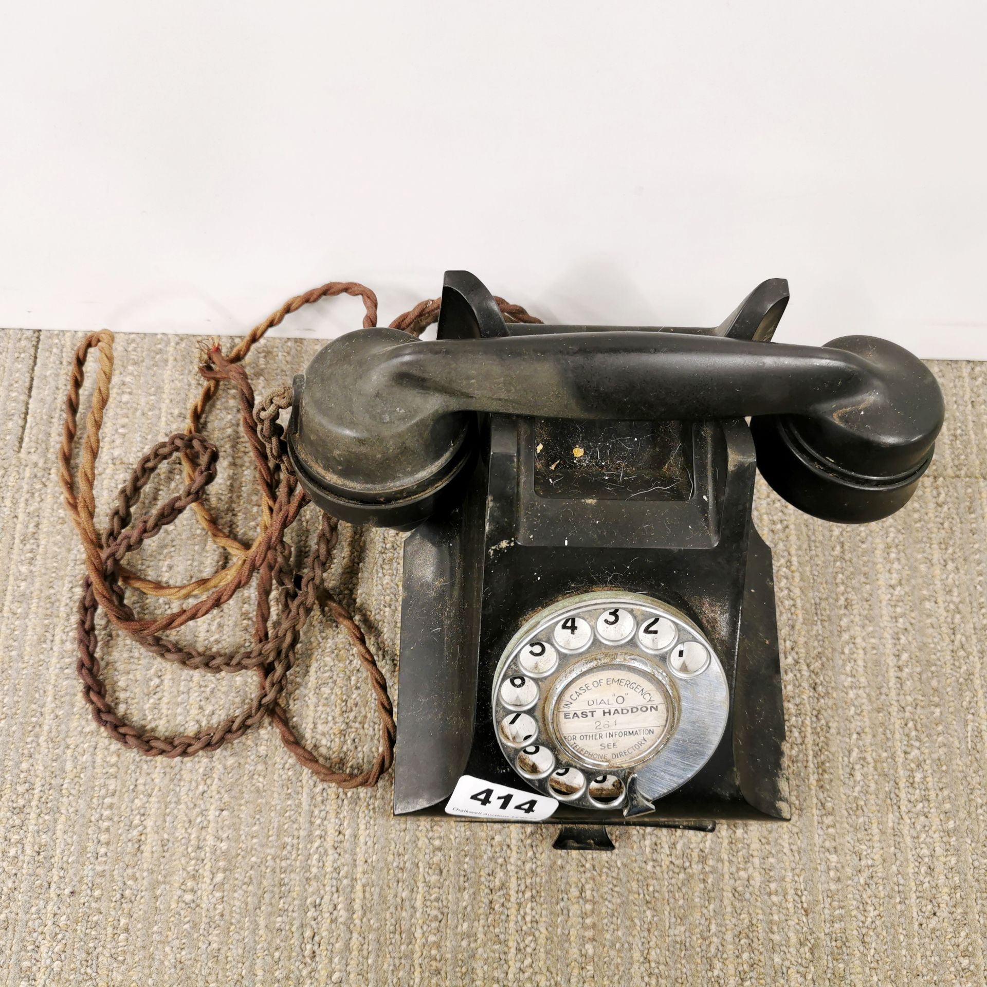 A black bakelite telephone. - Image 2 of 3