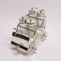 A silver plate and etched glass novelty cruet set, L. 16cm H. 13cm.