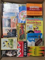 A quantity of mixed toys and games including four flexible records.