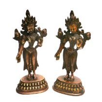 A pair of Tibetan bronze figures of standing Tara, H. 17cm.