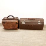 An antique leather Gladstone bag and a further antique travelling bag, W. 30cm.