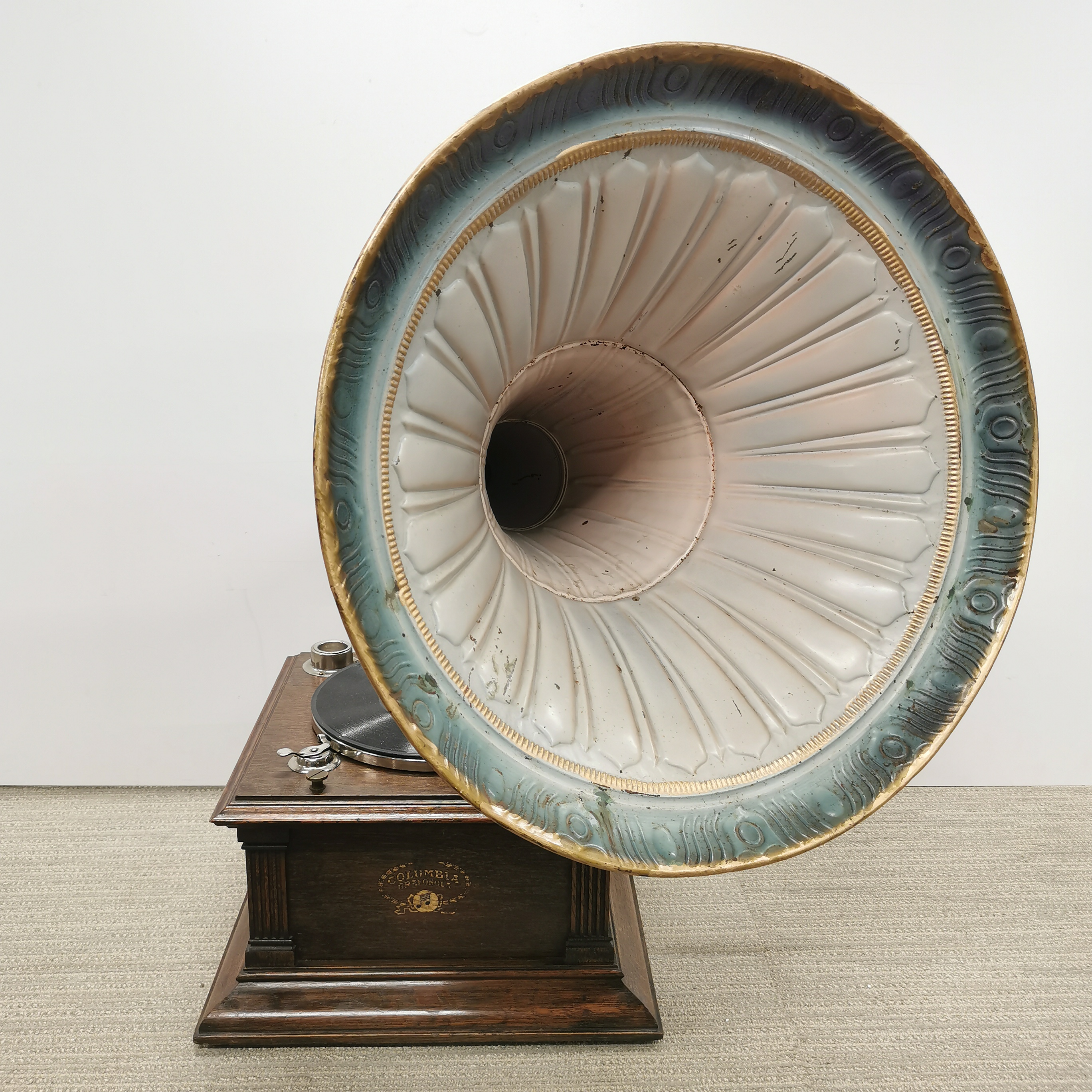 An original oak cased Columbia windup gramophone with full sized painted horn, H. 80cm.