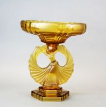 An Art Deco amber glass figural centerpiece dish, H. 27cm, dia. 21cm.