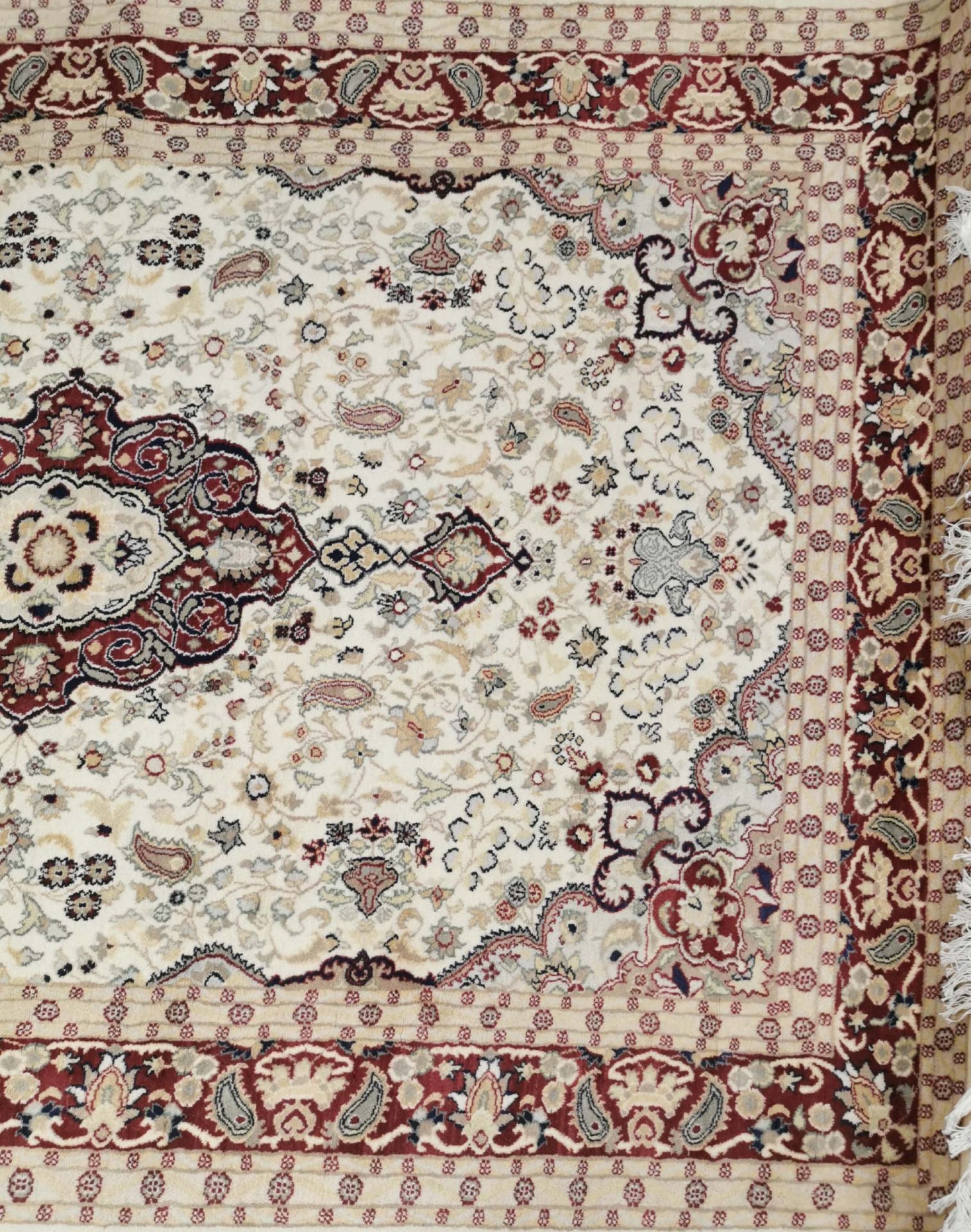 An eastern cream, beige and red ground wool rug, 280 x 185cm. - Image 2 of 3